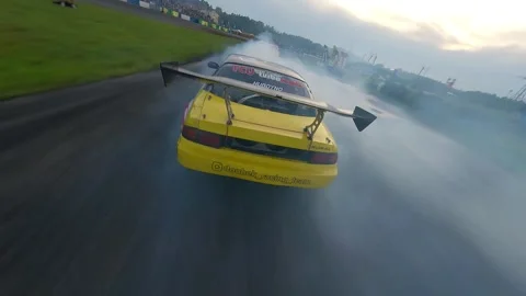 Overcast Golden Hour FPV Drone Chase of Tandem Drift with Heavy Smoke Stock-Footage 336101616
