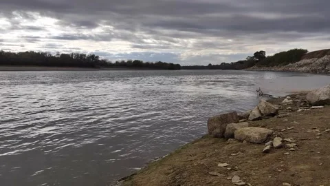 Overcast River Landscape with Gray Clouds and Calm Water Stock-Footage 291266829
