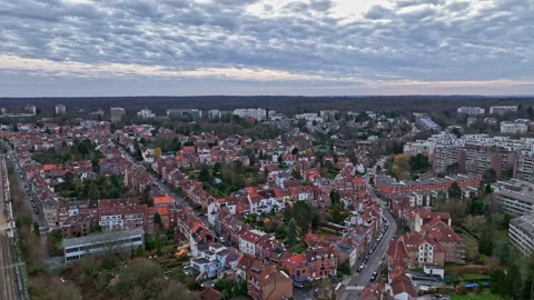 Overcast skies frame Brussels' rich history in an aerial panorama of homes  Stock Footage 250417855