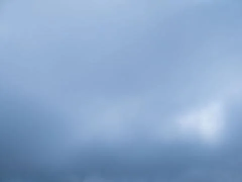 Overcast sky background with layered gray clouds and subtle natural light 스톡 사진