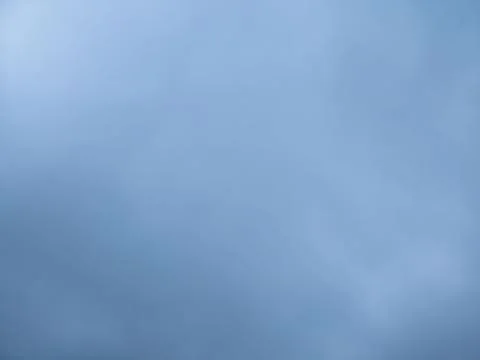 Overcast sky background with layered gray clouds and subtle natural light Stock-Fotos