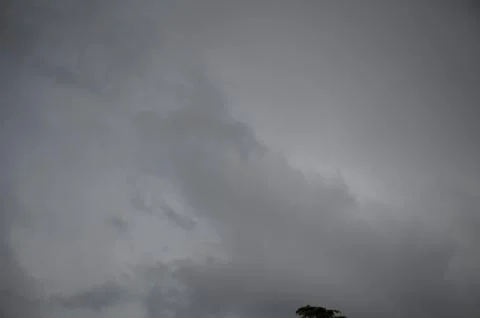 Overcast Sky Covered with Dense Gray Clouds Stock Photos