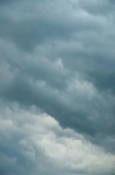 An Overcast Sky Creates Dramatic Storm Clouds &amp; Dark Atmospheric Weather Stock Photos