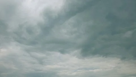 An Overcast Sky Filled with Dramatic and Intriguing Cloud Patterns Surrounding U Stock Photos