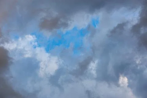Overcast sky, full-frame gray clouds background and texture Stock Photos
