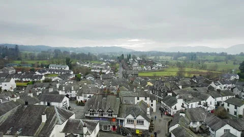 Overcast sky hovers above quaint village Stock Footage 345652491