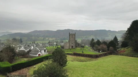 Overcast sky looms above ancient stone church Stock Footage 345651432