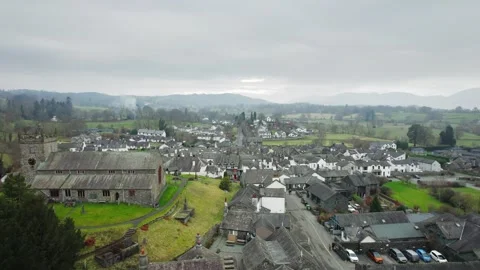 Overcast sky looms above ancient village rooftops Stock Footage 345651968