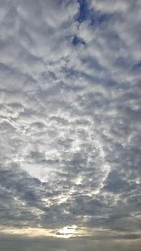 Overcast Sky with Rays of Sun Emerging Stock Photos