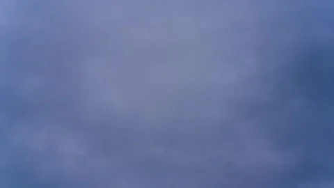 Overcast sky reveals approaching storm clouds in serene landscape Stock Footage 303215890