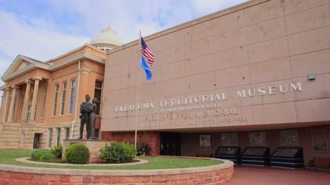 Overcast view of The Carnegie Library and Oklahoma Territorial Museum Stock Footage 195144182