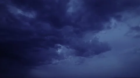 Overcasted and cloudy dark blue sky with mood cumulus clouds. Rainy and ominous Stock Footage 164547901