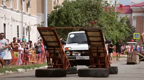 Overcoming roadblocks during car trial 4x4 Stock Footage 64570131