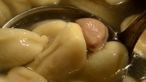 Overcooked dumplings is being prepared Stock Footage 291607682