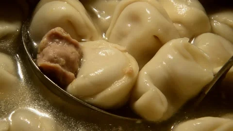 Overcooked dumplings ravioli Stock Footage 291554092