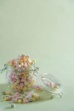 Overfilled jar with marshmallow Stock Photos