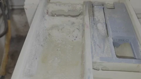 Overfilled washing machine detergent drawer with laundry powder residue. Stock Footage 335195771