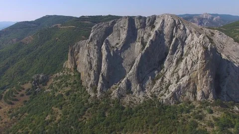 Overflight above rocky cliffs, aerial video Stock Footage 80989719