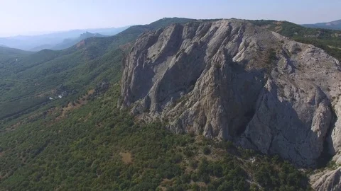 Overflight above rocky cliffs, aerial video Stock Footage 80989730