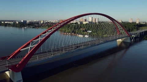Overflight of the bridge from the air. Large rope red road bridge Stock Footage 165324377