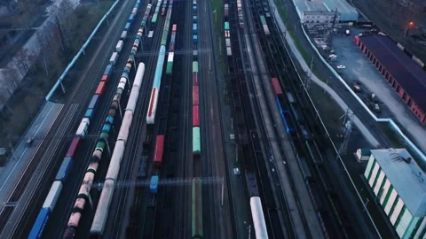 Overflight of a freight railway junction in the early morning Stock Footage 252033370