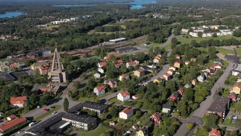 Overflight of a Swedish small town with drones Stock Footage 161109759