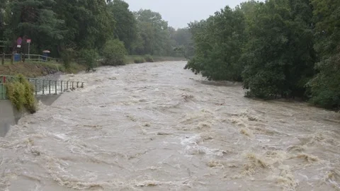 The overflow of the city river during flooding after heavy rains. Video stock 284730676