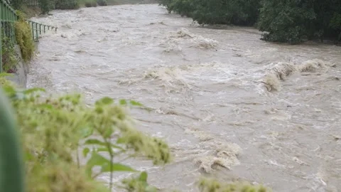 The overflow of the city river during flooding after heavy rains Stock Footage 284736918