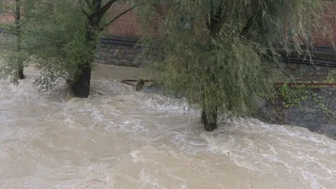 The overflow of the city river during flooding after heavy rains. Stock Footage 284738569