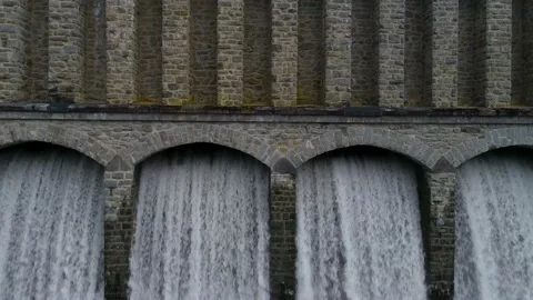 Overflow dam drone flight close to the dam wall with sound recording Stock Footage