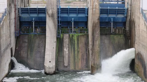 Overflow gate opened on a big concrete dam Stock Footage 312808179