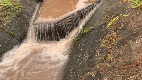 The overflow of a small dam. Stock Footage 139919808