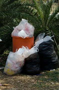 Overflowing Garbage bin Stock Photos