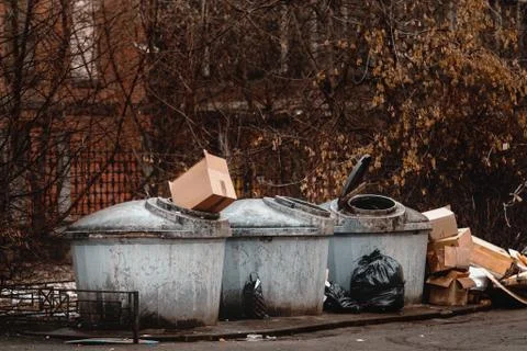 Overflowing garbage container. trash cans in the city. Stock Illustration