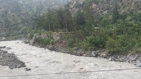 Overflowing Indian rivers after sudden dam water release amid suspension Stock Footage 318445033