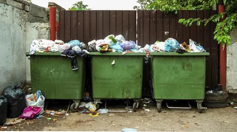 Overflowing trash cans Stock Photos