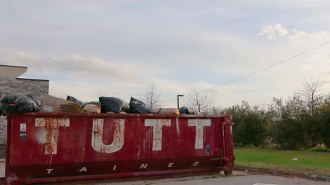 Overflowing waste trash dumpster open top junk container Video stock 149454031