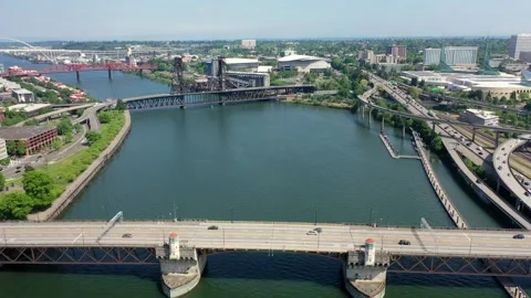 Overflying Willamette River from Burnside Bridge to Steel Bridge  Stock Footage 244005545