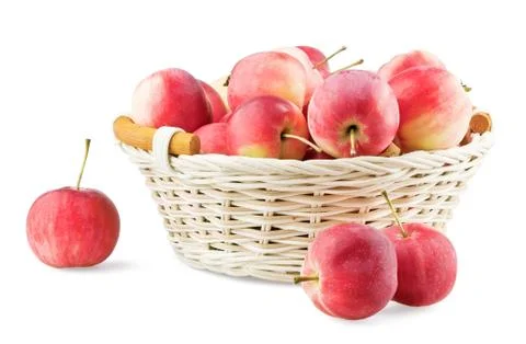 Overfull backet with mini apples Stock Photos