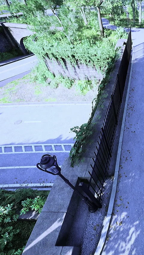 Overgrown green plants on stone wall next to empty road and sidewalk Stock Footage 334261645