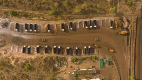 Overhead Aerial Dump Trucks Parked at Thar Coal Mine Yard Pakistan Stock Footage 337907734
