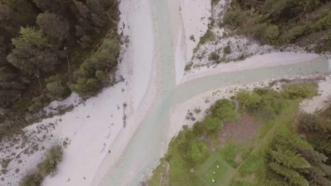 Overhead aerial flight above river creek with woods and rocks. Summer adventure Stock Footage
