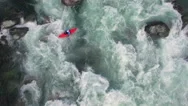 Overhead Aerial Shot Of Man In Kayak On Raging River With Rapids Stock Footage