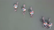 Overhead Aerial Tracking Shot Of Bamboo Rafts Sailing On A River In China Stock Footage