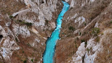 Overhead aerial of turquoise river between steep limestone canyon walls Stock Footage 335518962