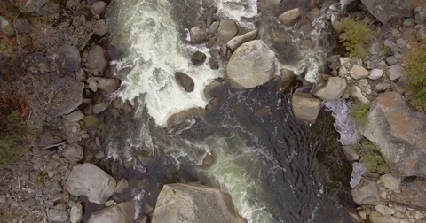 Overhead Aerial View Looking Down at Rushing River Stock Footage 76006997
