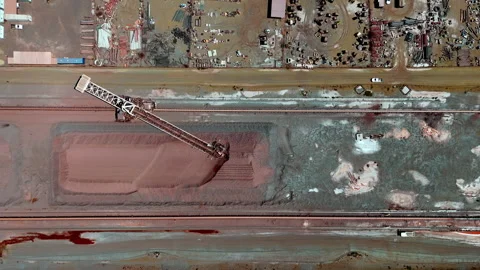 Overhead aerial view of mining conveyor system moving mined ore around Stock Footage 333017588