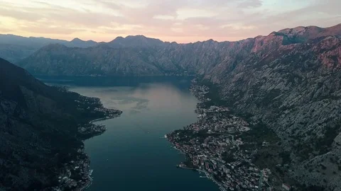 Overhead aerial view of rooftops and streets in historic old town of Kotor and Stock Footage 114315416