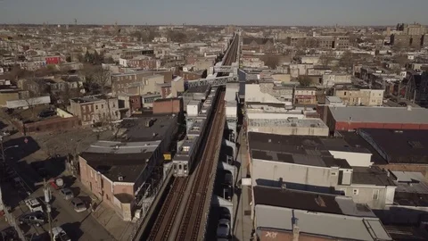 Overhead Aerial View of Train Passing by in Kensington Philadelphia Video stock 119630012