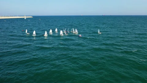 Overhead aerial view of training with optimist near the Marina Valencia, Spain. Stock Footage 144537118